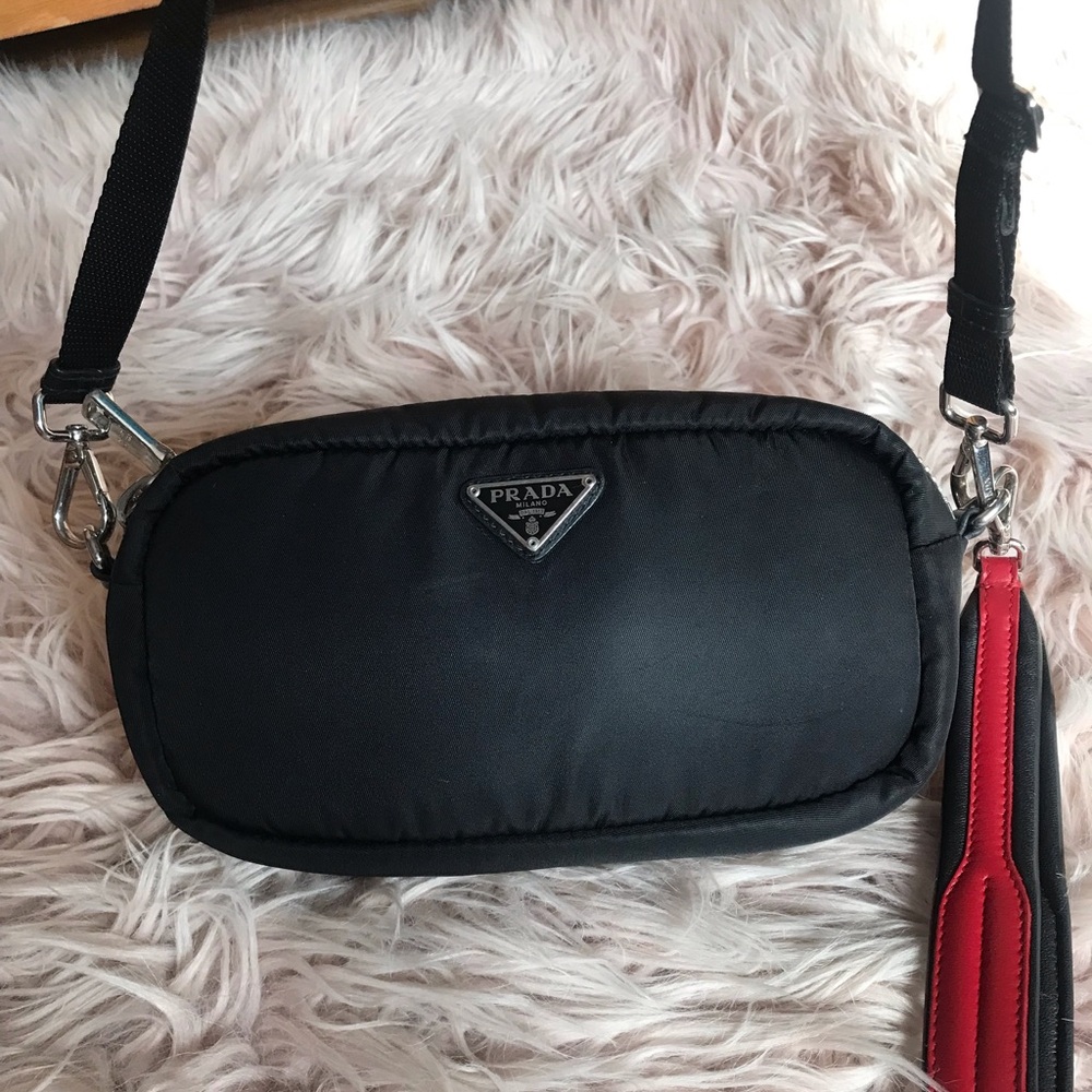 Prada tessuto crossbody bag with 2 straps.